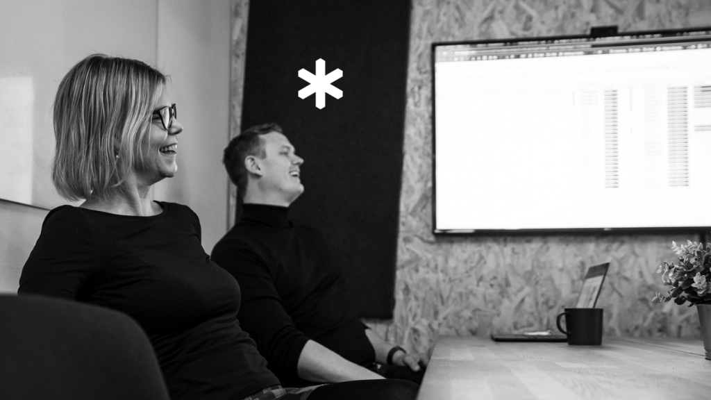 Colleagues-smiling-in-a-workshop